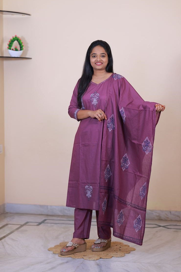 SreeVastra purple cotton 3-piece dress featuring delicate white embroidery on the kurta and matching dupatta