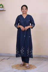 SreeVastra navy blue cotton 3-piece dress with white floral embroidery, V-neckline, and three-quarter sleeves.